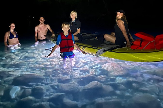 Giant Glow Paddleboarding the Downtown Skyline with Bats - Turning On Your Glow Lights: 12 Color Combos Over Dark Water